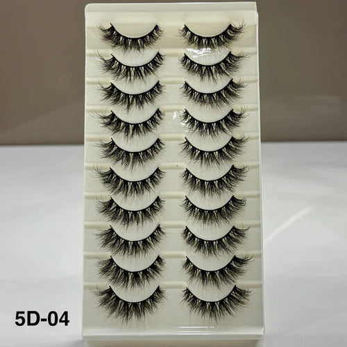Set of false eyelashes on a display card with a neutral background