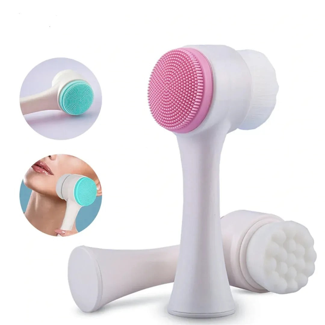 White facial cleansing brush with pink and green accents on a white background