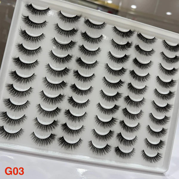 Set of false eyelashes in a white tray with 'G03' label.