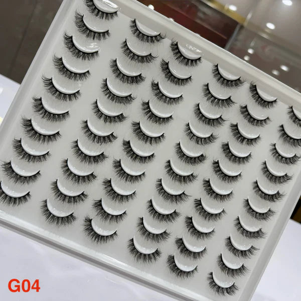 Set of false eyelashes on a tray with a clear background