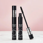 BOB Super Curl Mascara Thick Intense Waterproof with open cap on a white surface against a pink background