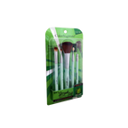 Set of makeup brushes in a green and white packaging on a white background