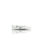 White tube of Glamorous Face eyelash adhesive on a white background