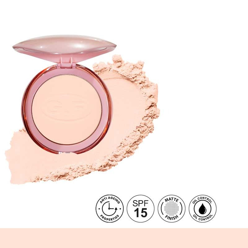 Compact powder with a pink case on a white background, featuring SPF 15, matte finish, and oil control icons.