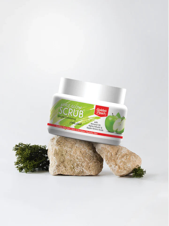 Jar of Golden Pearl Apple Glow Facial Scrub with green label on a white background