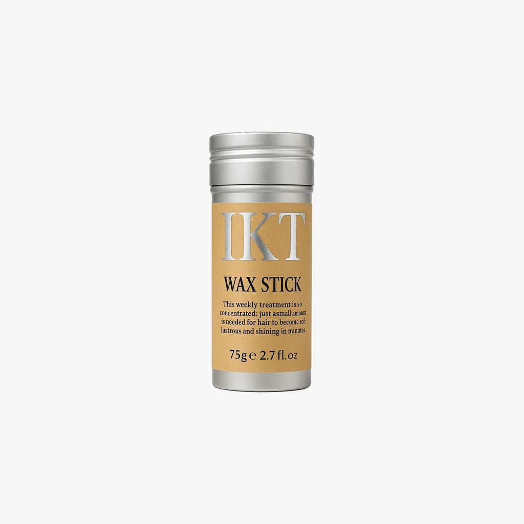 IKT - Hair Wax Stick container with metallic top and beige label on a white background