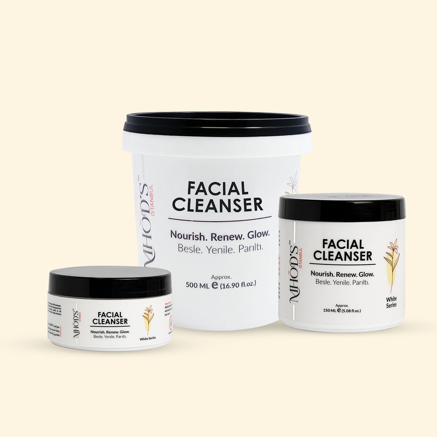 Three containers of MHOD's Facial Cleanser on a beige background