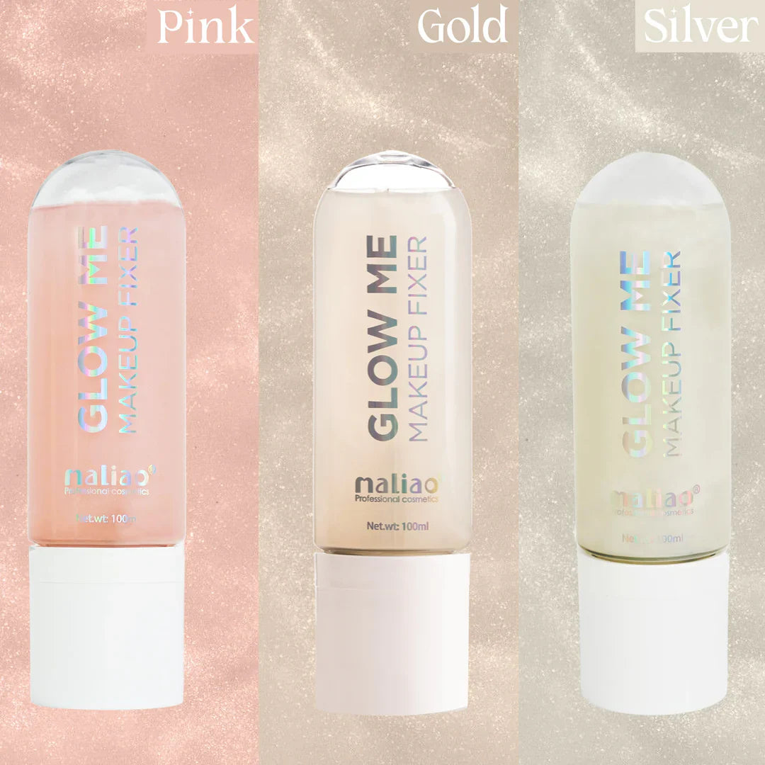 Three bottles of 'Glow Me' makeup fixer in pink, gold, and silver on a gradient background.