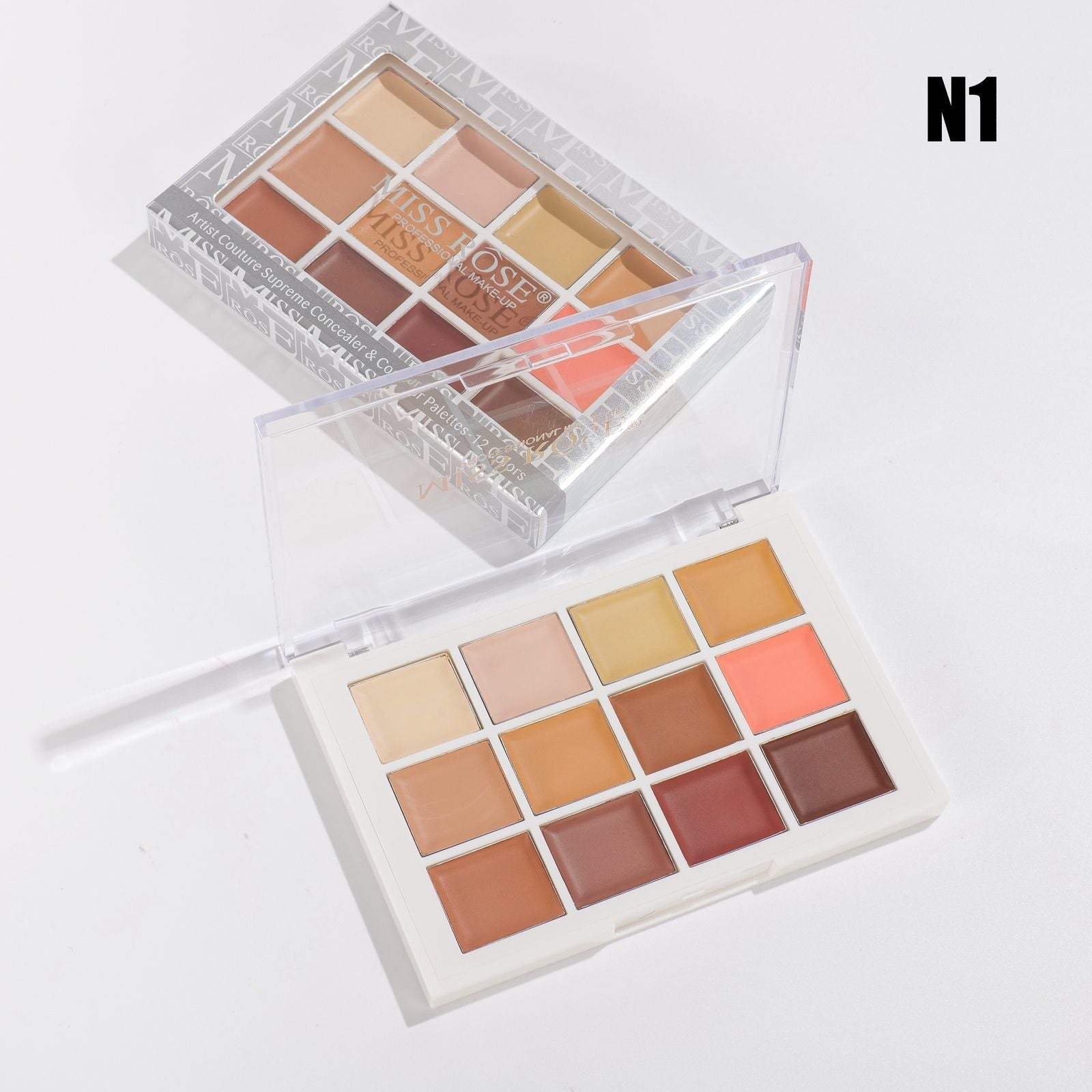 Makeup palette with various shades of eyeshadows on a white background