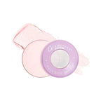 Makeup product with pink case and purple lid on a white background