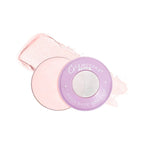 Makeup product with pink case and purple lid on a white background
