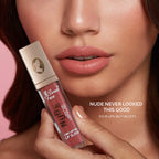 Lip gloss with a woman's lips and text 'Nude Never Looked This Good' on a pink background