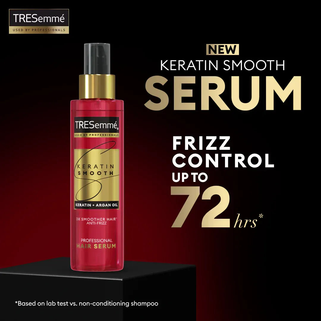 TRESemme Keratin Smooth serum bottle with promotional text on a dark background