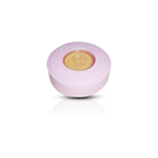 Pink cosmetic container with a gold lid on a white background